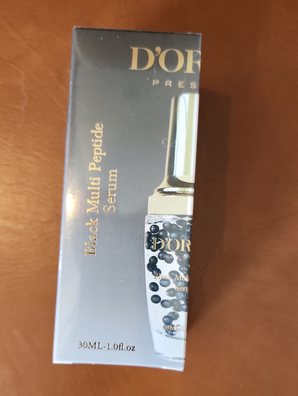 D'OR Black Multi Peptide Serum - White & Gold